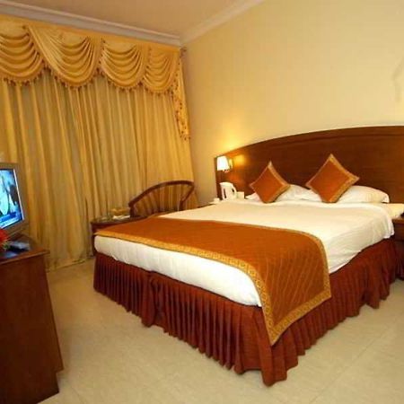 Aj International Hotell Bangalore Rum bild